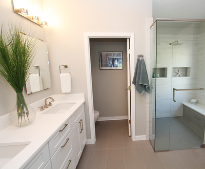 Okotoks bathroom renovation wall lighting, recessed lights, GFCI receptacle, in floor heating by First Aid Electric.