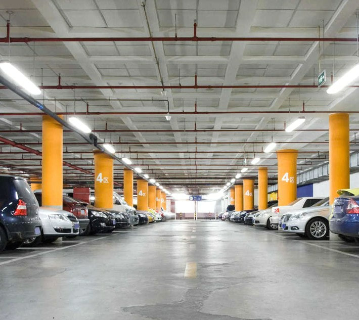 Commercial parkade lighting, emergency lighting, fire alarms, CO detectors by First Aid Electric.