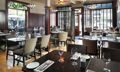 Commercial restaurant dining room lighting by First Aid Electric Calgary.