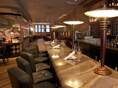 Commercial restaurant bar lighting, appliances rewiring and smoke detectors installation by First Aid Electric Calgary.