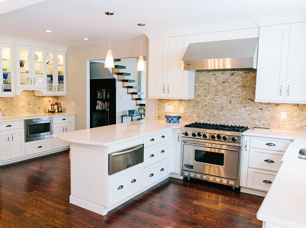 Kitchen renovation -  recessed lights, in cabinet lights, under cabinet lights, pendant lights and appliances outlet by First Aid Electric Calgary.
