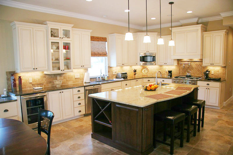 Kitchen remodeling -  recessed lights, pendant lights, under cabinet lights by First Aid Electric.